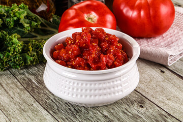 Diced ripe tomato with sauce