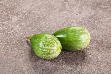 Ripe green mini eggplants heap