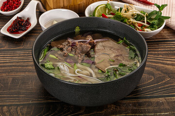 Vietnamese Pho Bo soup with beef and noodles