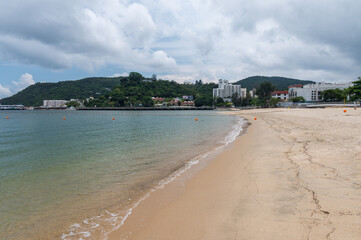 Silvermine Bay Beach located on Tung Wan Tau Road in Mui Wo, Lantau Island, Hong Kong. Seascape and nature, sunny day