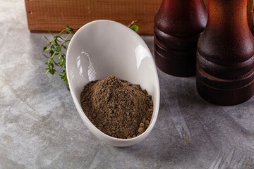 Ground dry black pepper powder