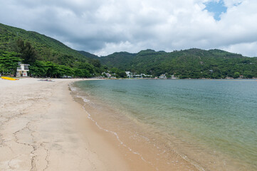 Silvermine Bay Beach located on Tung Wan Tau Road in Mui Wo, Lantau Island, Hong Kong. Seascape and nature, sunny day