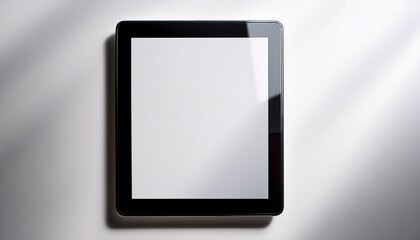 blank screen tablet device isolated on a white backdrop black frame centered with soft shadows minimalistic design ideal for mockups