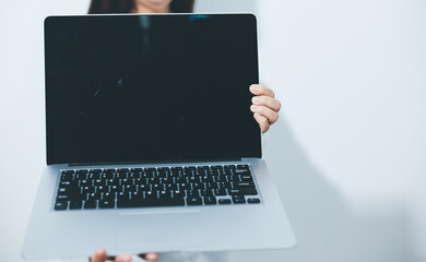 Female druggist standing with a digital tablet