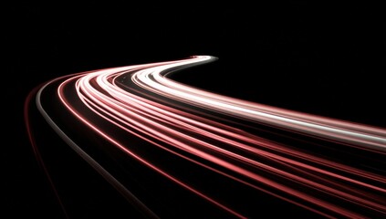 Abstract light trails curving on a black background