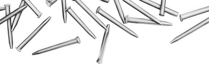 Scattered metal nails isolated on transparent background