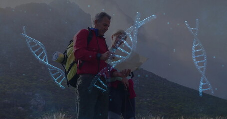 Mature hikers wearing red jackets reading map on mountain, with backpack, poles and DNA helices