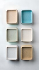 Fototapeta premium Six Small Square Ceramic Dishes in Pastel Colors
