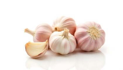 Vibrant Closeup Shot of Organic Garlic Cloves Displayed on a White Background Capturing Their Freshness and Texture for Culinary Use