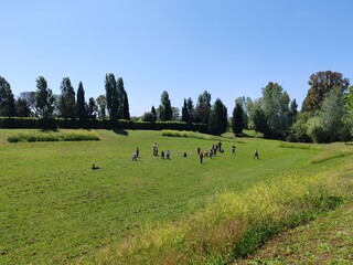 Ostia, Rome, April 15, 2025, children from an elementary school, on a school trip, have fun running and playing in a protected ecological oasis.