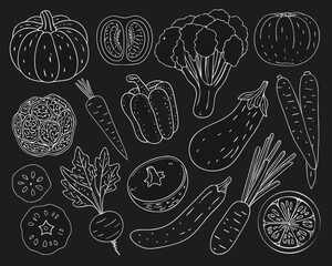 Collection of hand drawn vegetables and fruits on black background