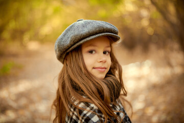 child in autumn forest