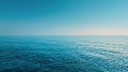 Obraz premium A tranquil horizon shot of a calm sea under a clear sky. This image evokes a sense of peace, solitude, and the vast, endless beauty of nature.