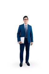 Full body asian business man stands confidently holding a laptop in his hands. This businessman is dressed in a smart business suit.