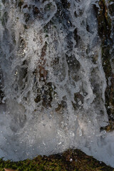 High-Speed Waterfall: Cascading onto Grass Blades