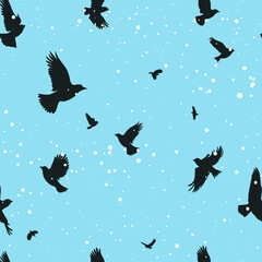 Obraz premium Flying black birds silhouette pattern on light blue background with snowflakes