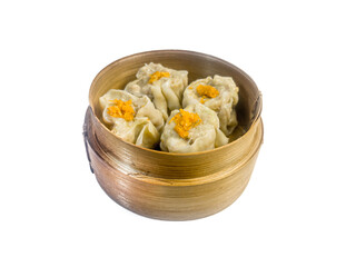 Traditional steamed dim sum dumplings in a bamboo basket isolated on a white background. Asian cuisine, Chinese food concept.