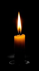 A luminous candle flame dances in the darkness, casting a warm glow and creating a peaceful atmosphere.