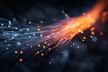 A long, thin, orange and blue wire with many small dots