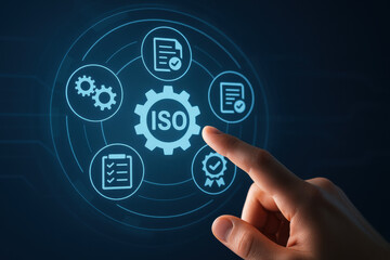 Naklejka premium ISO certification concept with hand pointing on digital interface with icons