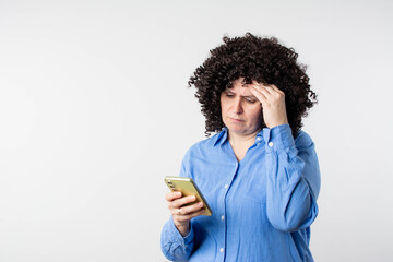 Worried Woman Looking At Smartphone Isolated Background With Copy Space
