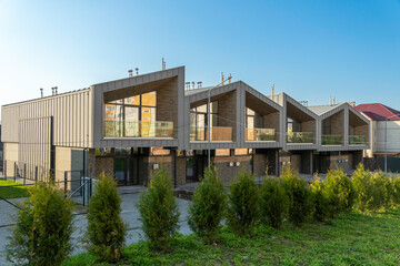 Obraz premium A modern townhouse with a private garden,