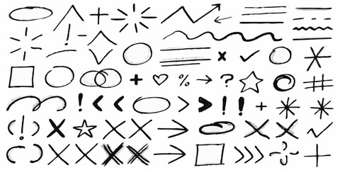 Collection of hand drawn black and white graphic elements and symbols on a white background © Partha