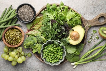 Superfood. Different healthy products on light grey table, flat lay