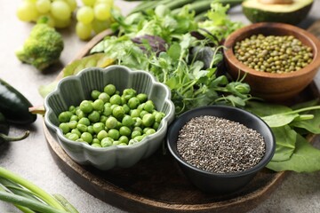 Superfood. Different healthy products on light grey table, closeup