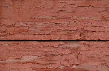 Background, texture wood covered with light brown paint, crumbling over time
