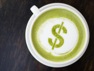 Over cup of matcha latte with price symbol in foam, this creative drink highlights value and trend