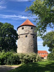 Fototapeta premium Medieval stone tower with red roof in Tallinn, Estonia