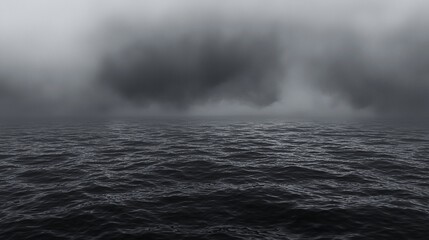 Naklejka premium Ominous ocean shrouded in grey clouds