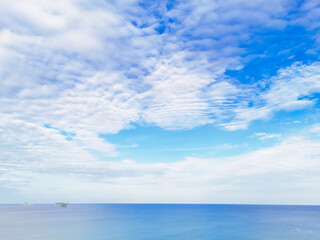 Obraz premium Aerial view sea water and sky clouds holiday travel Thailand. Summer beach for concept environment natural background. Top view Horizon Landscape sea beach aerial. Ocean. Blue sky clouds 
