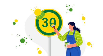 Fototapeta premium Woman Refreshing a Roadside Speed Limit Sign With Vibrant Colors