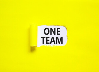 One team symbol. Concept word One team on beautiful white paper. Beautiful yellow paper background. Business one team concept. Copy space.