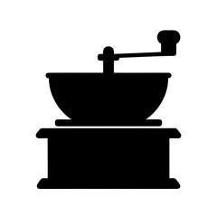 Silhouette of a Vintage Coffee Grinder with Hand Crank for Brewing Coffee