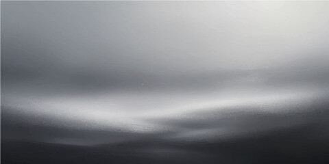 Brushed metallic texture of a gray steel plate with a shiny chrome pattern on a smooth aluminum surface