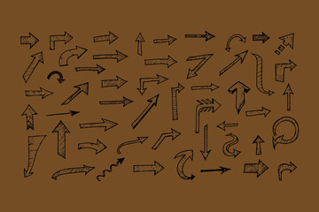 A diverse collection of hand drawn arrows in various styles and directions presented on a warm brown background evoking a sense of direction and guidance