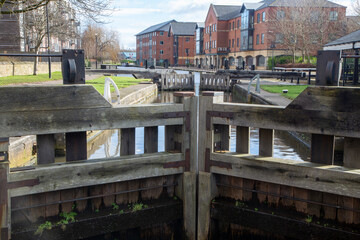 A view towards Wigan Pier looking over a series of lock gates on the Leeds Liverpool canal