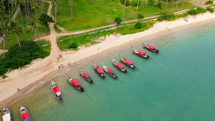 Railay Peninsula near Ao Nang. A hidden cozy place on the beach under palm trees, surrounded by...