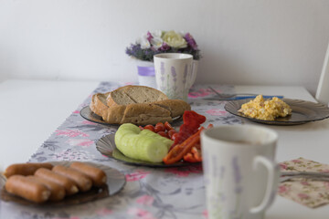 Food prepared on the table in the kitchen. Breakfast menu