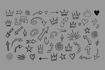 A collection of hand drawn doodle elements featuring crowns arrows stars hearts and abstract shapes on a gray background for design projects