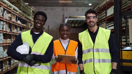 headshot of Warehouse workers smiling at camera confident - Powered by Adobe