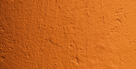 Orange banner with painted wall texture. Bright orange background
