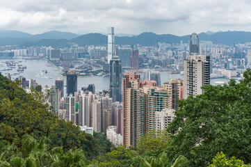 View of Hong Kong and Kowloon from Victoria peak. Panorama of Hong Kong, skyscrapers and nature.