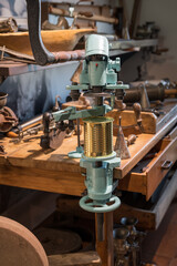 Hand can sealer mounted on a table.
