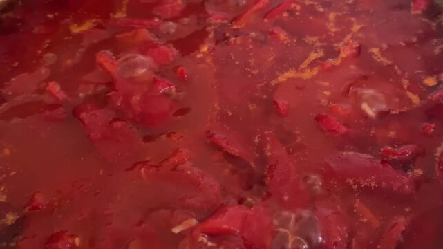 red pepper lecho boiling in a saucepan. High quality 4k footage