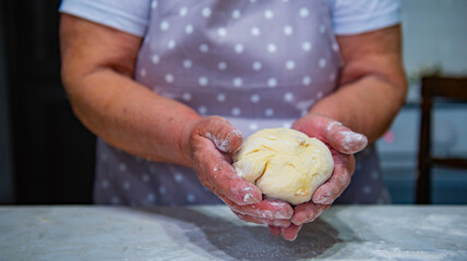 One grandmother kneaded the dough for pies