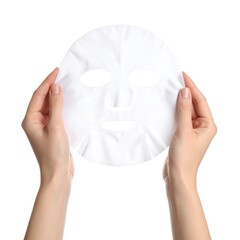 Hands holding a facial sheet mask